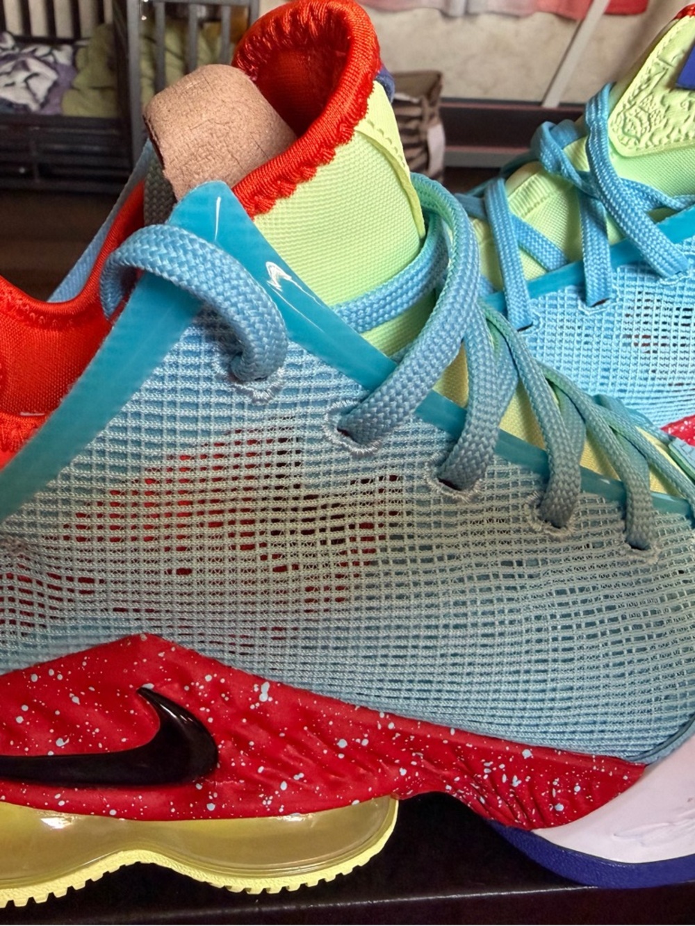 Nike Light Blue Basketball Sneakers with Red and Yellow Accents